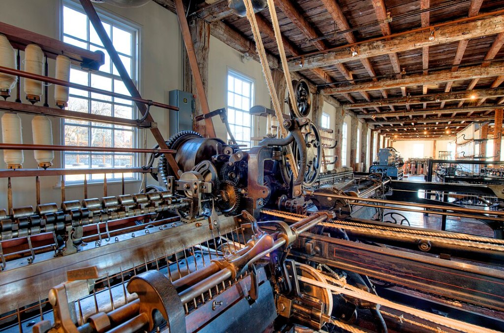 Slater Textile Mill in Rhode Island, started operation in 1793. This is the Spinning Mule process. Textiles, pottery and lumber were some of the earliest industries.